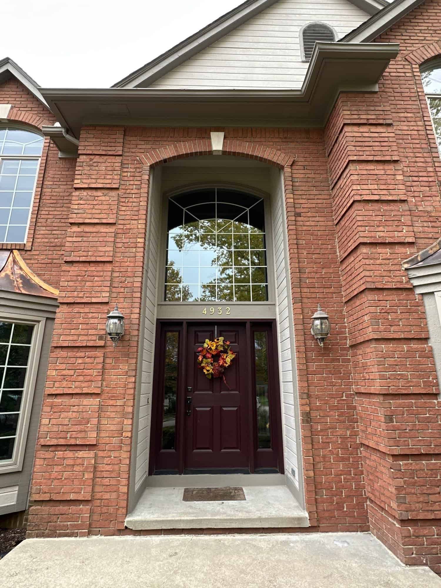 Front door of a brick house.